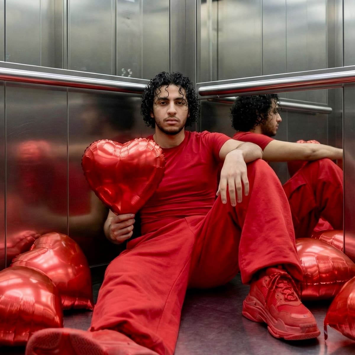 Valentine Red Suit Elevator Prompt — Portrait AI art prompt example for Gemini and Stable Diffusion