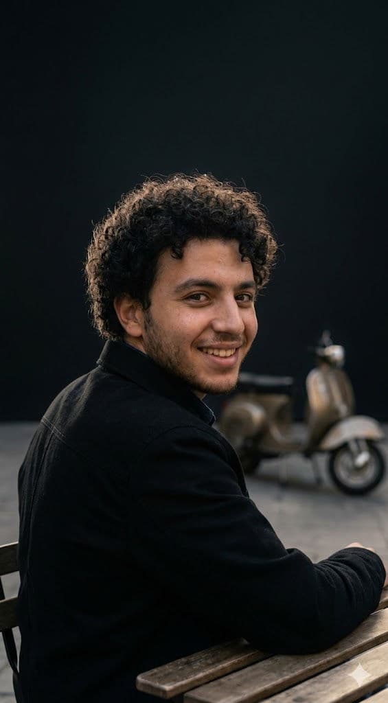 Over-the-Shoulder Cinematic Portrait – Dark Editorial Studio Back Angle with Dramatic Rim Lighting (8K Ultra-Realistic) — Portrait AI art prompt example for Gemini and Stable Diffusion