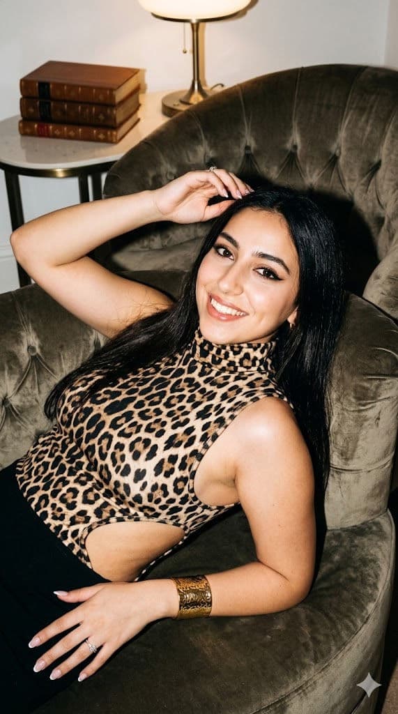 Dior-Style Editorial Portrait – Woman in Leopard Print High-Neck Top Reclining in Textured Armchair, Bright Flash Photography — Portrait AI art prompt example for Gemini and Stable Diffusion