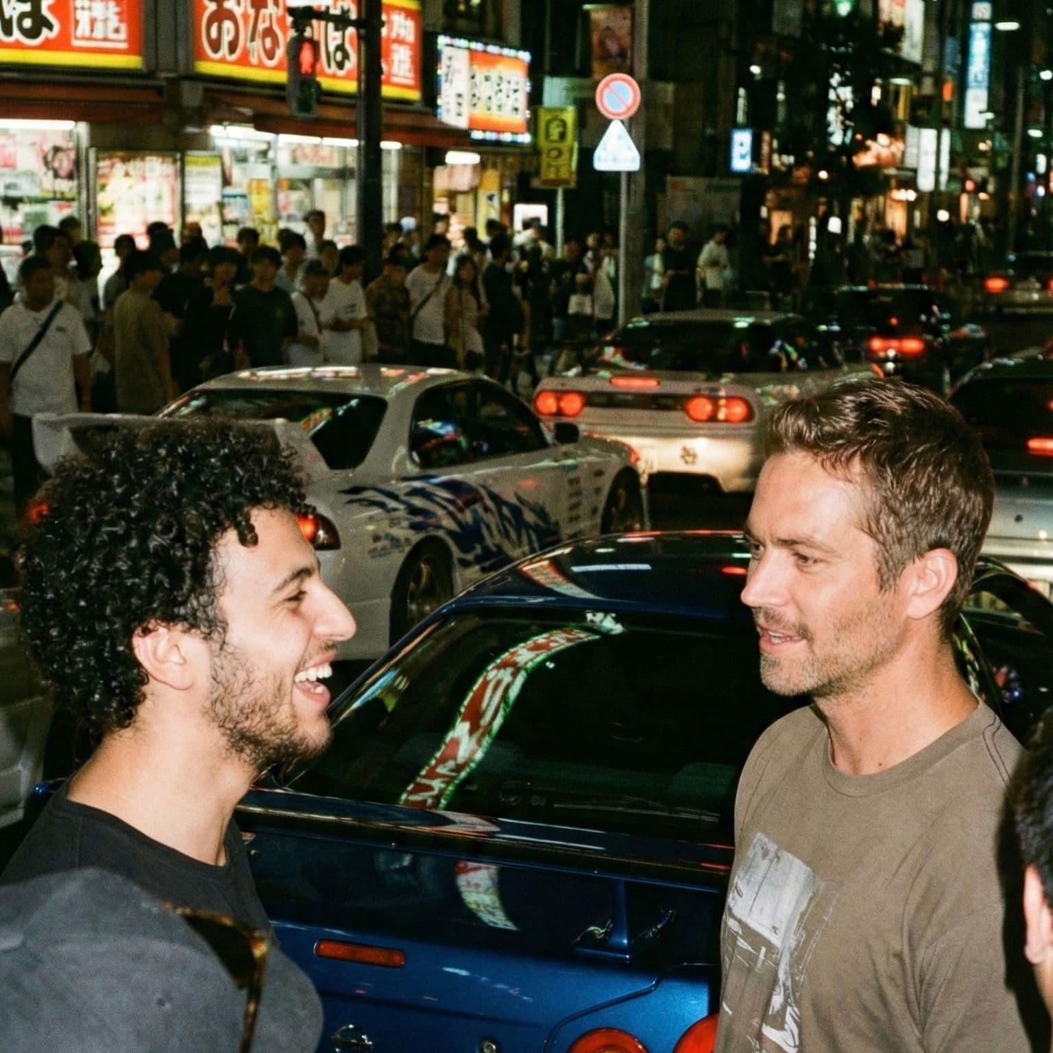 Tokyo Drift Legends: Candid Street Meeting with Paul Walker — Portrait AI art prompt example for Midjourney and Stable Diffusion